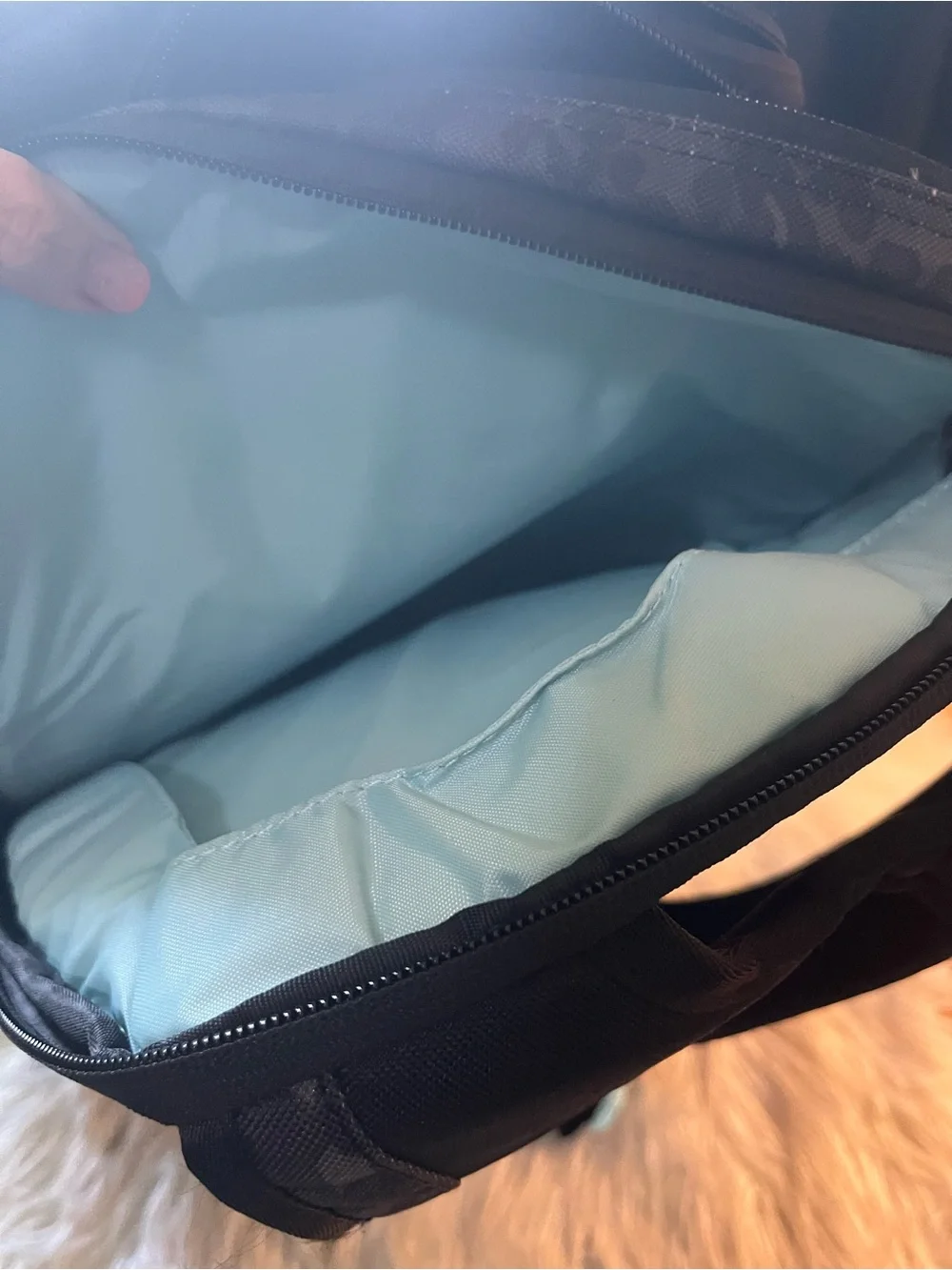 Dakine Black Leopard-Print Backpack with Teal Zipper Accents
